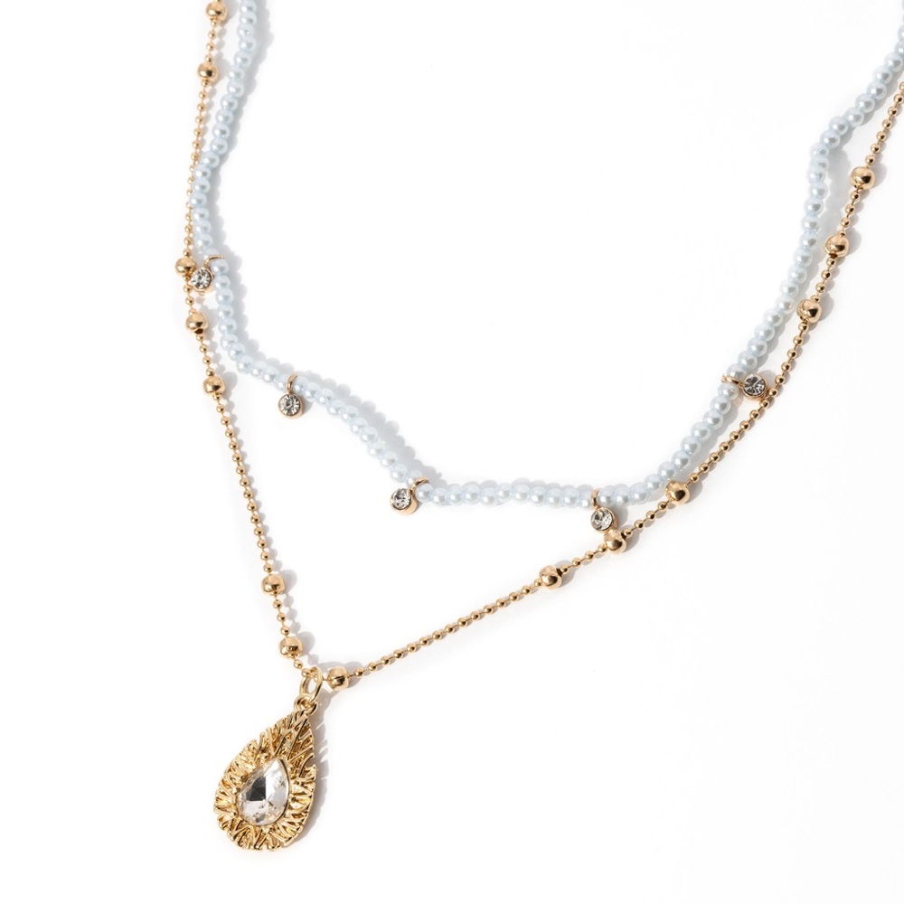 Elegant Gold and White Necklace